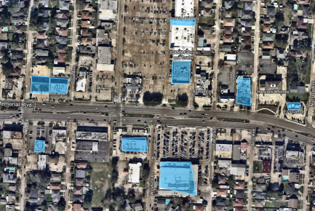 Satellite view of a commercial corridor with individual properties highlighted in blue, each one drawn as its own geo-fence